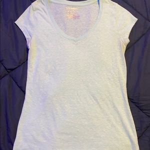 Teal/mint colored v-neck shirt